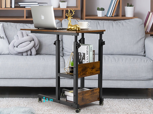 Height adjustable laptop table